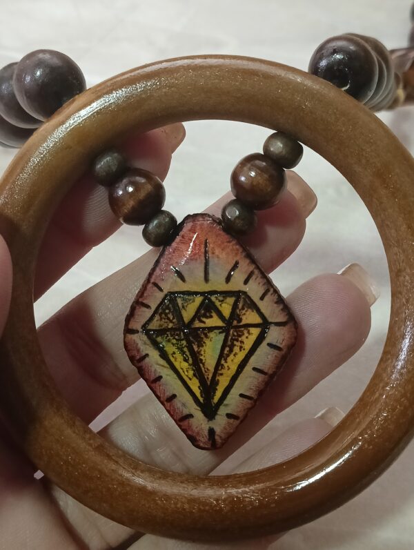 Exquisite collection of handmade wood-burning jewelry