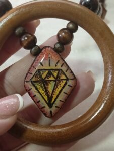one-of-a-kind woodburning jewelry 