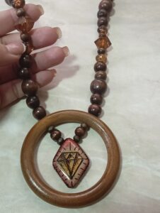 Exquisite collection of handmade wood-burning jewelry